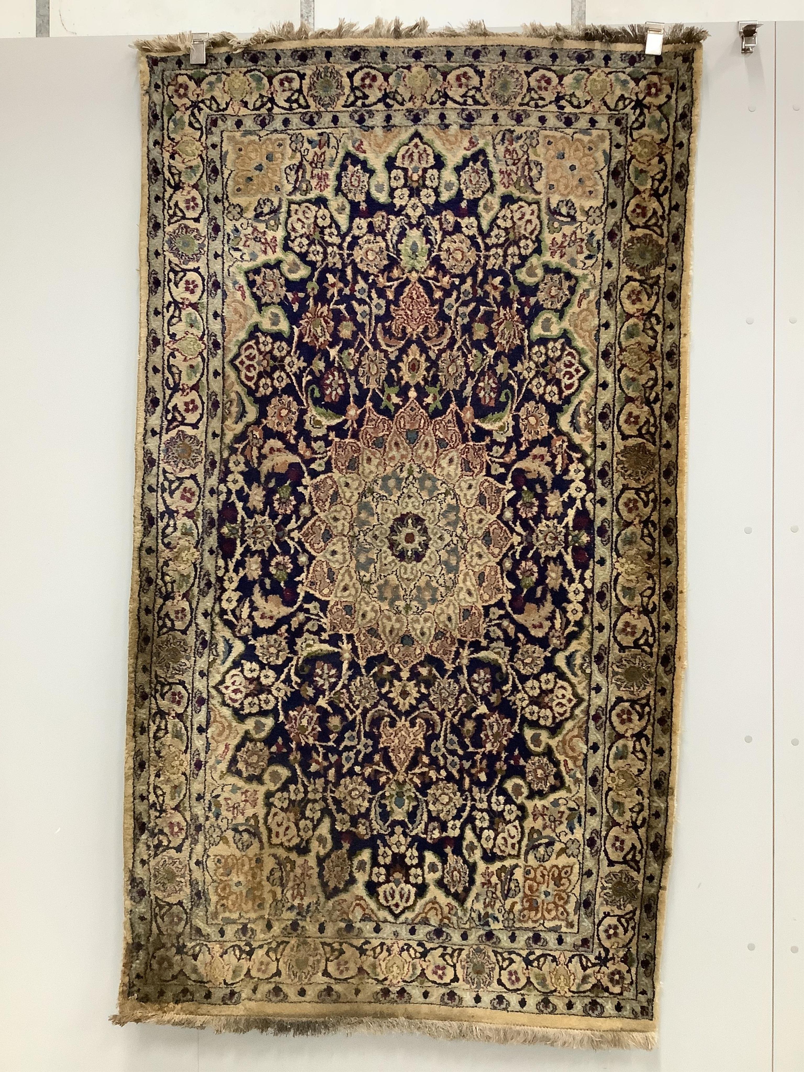 Three North West Persian style rugs and one other rug, largest 200 x 110cm. Condition - poor to fair